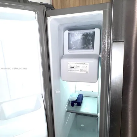 a picture of a bathroom with a sink and a mirror
