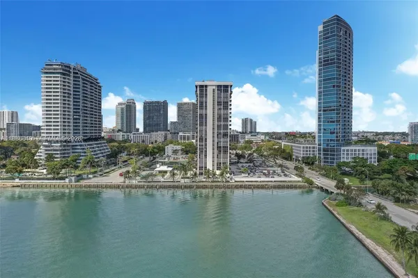 a view of a city with tall buildings