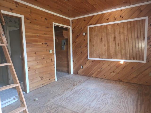 422 Evans Hollow Road Murphy, NC 28906 - Photo 14 of 34 a view of walk in closet with wooden floor