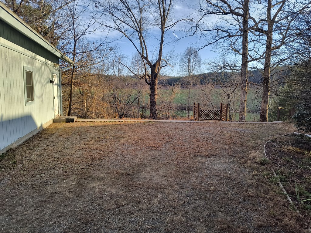 422 Evans Hollow Road Murphy, NC 28906 - Photo 25 of 34 a big yard with trees in the background