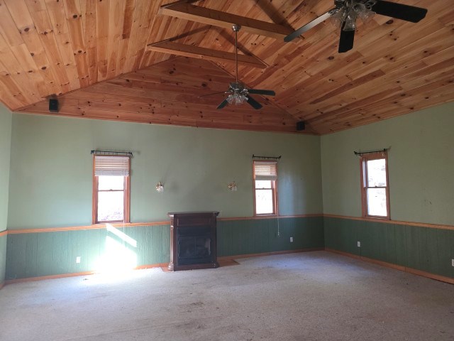 422 Evans Hollow Road Murphy, NC 28906 - Photo 10 of 34 a view of an empty room with window and wooden floor