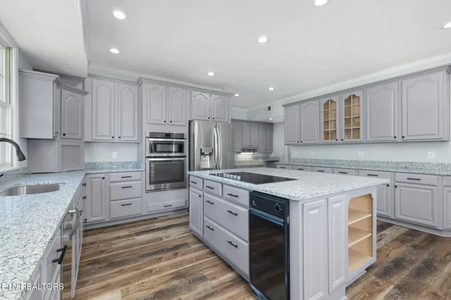 a bathroom with a glass shower door