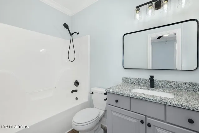 an aerial view of a house with yard swimming pool and outdoor seating