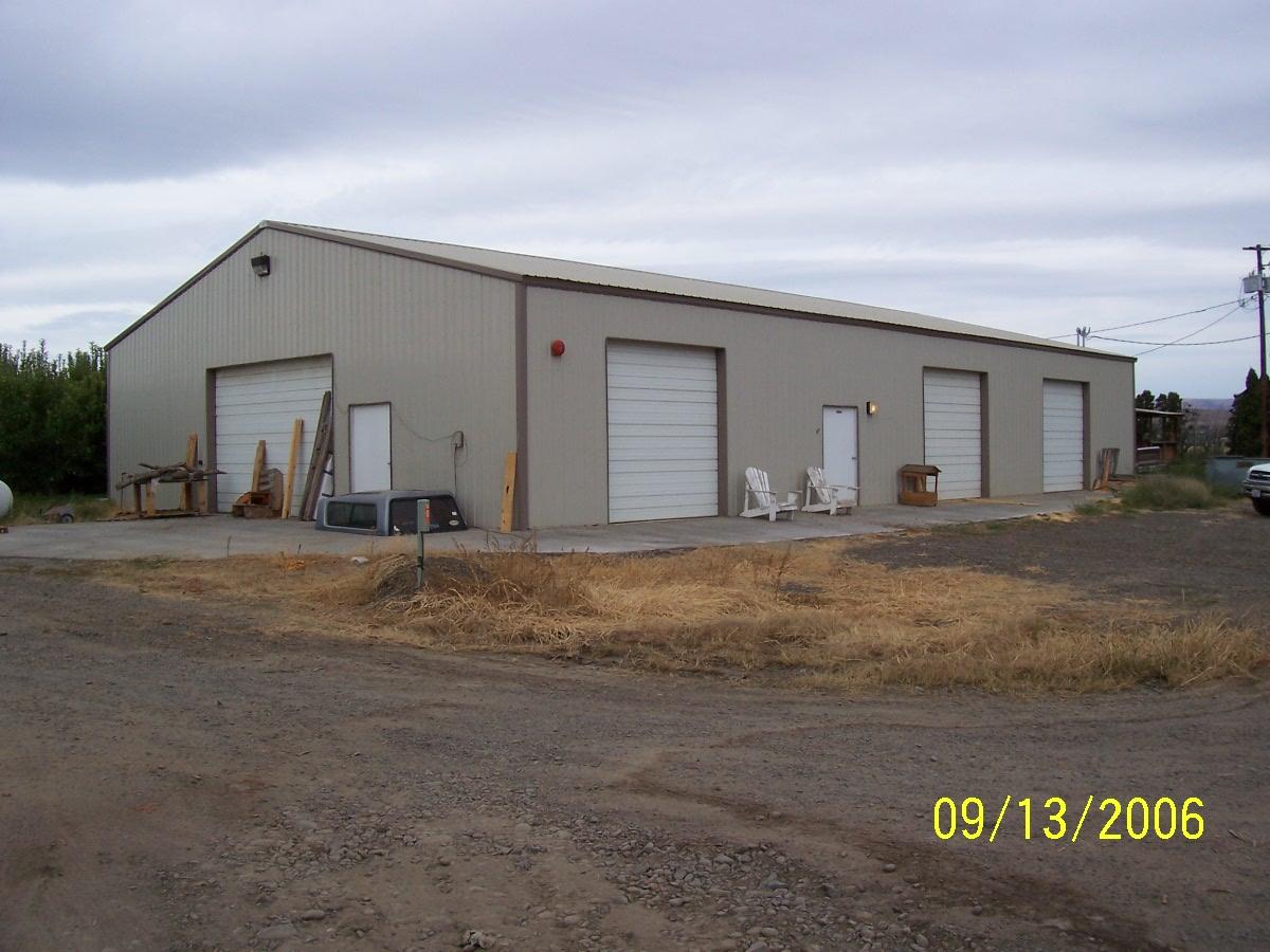 1702 Moore Road Yakima, WA 98908 - Photo 1 of 10 a view of a house with a yard