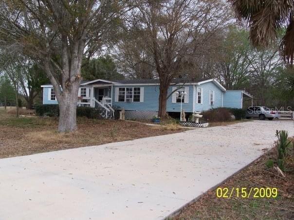 4502 Fox Ridge Boulevard Wesley Chapel, FL 33543 - Photo 1 of 1 front view of a house with a yard