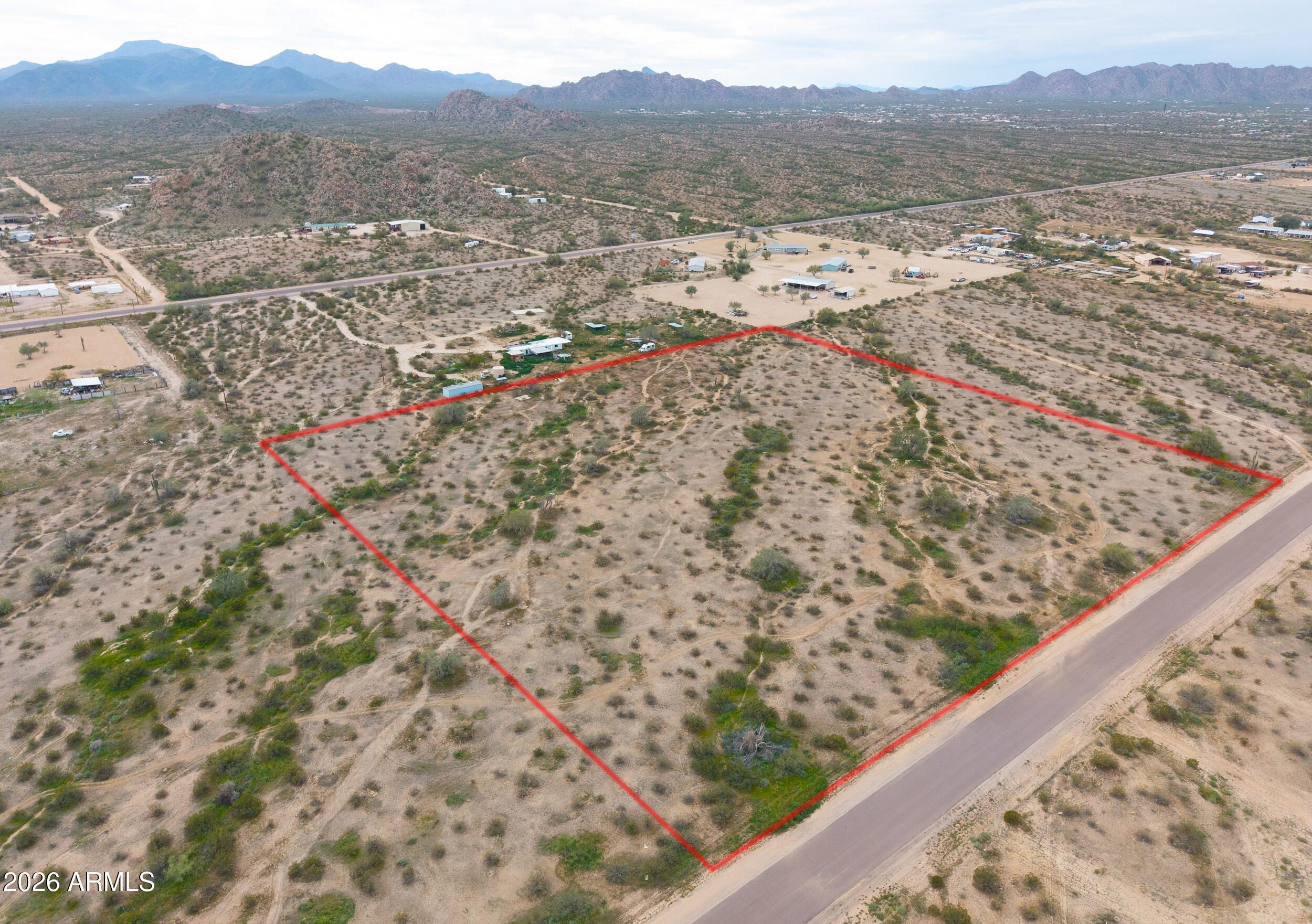 0 West Dune Shadow Road, Unit 42 Maricopa, AZ 85139 - Photo 16 of 25 a view of a lake with mountains and valleys in the background