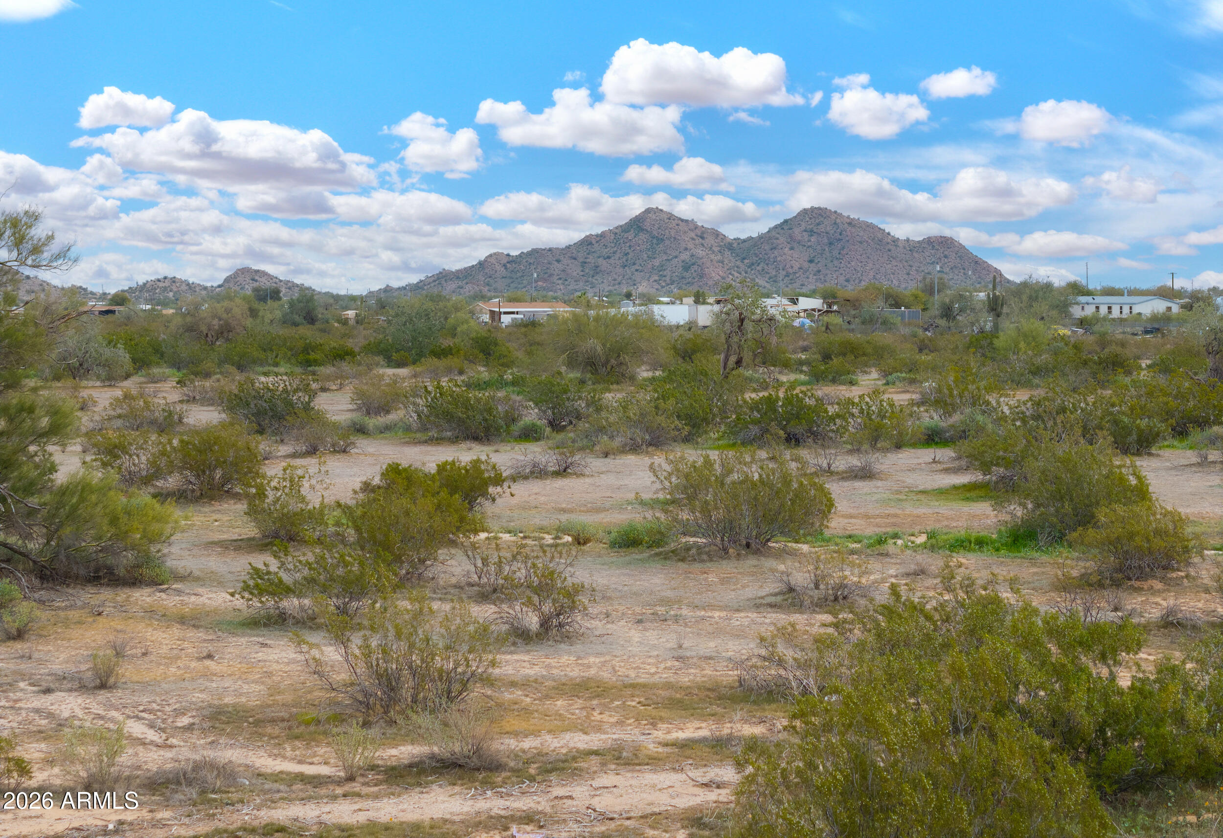 0 West Dune Shadow Road, Unit 42 Maricopa, AZ 85139 - Photo 2 of 25 a view of lake with mountain