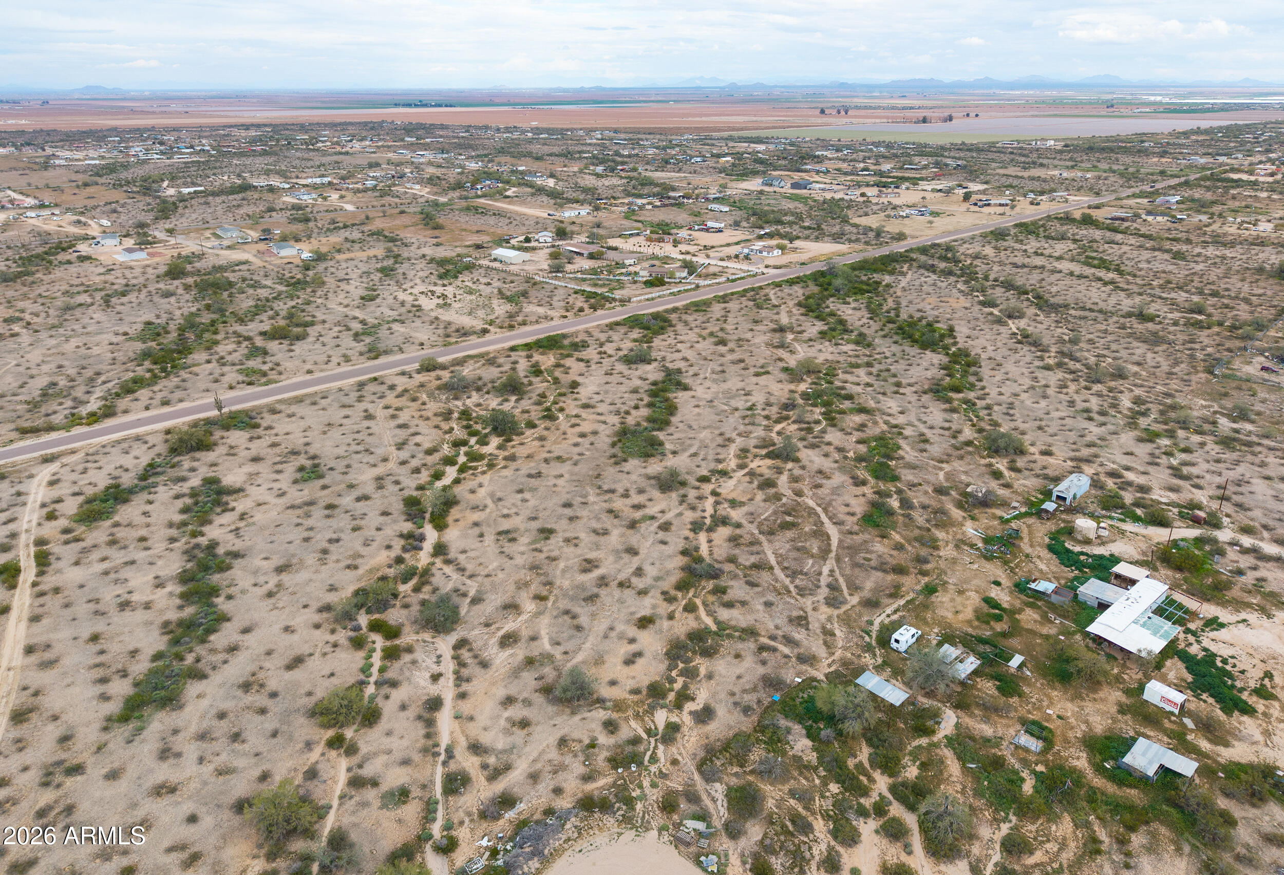 0 West Dune Shadow Road, Unit 42 Maricopa, AZ 85139 - Photo 23 of 25 an aerial view of residential houses with outdoor space