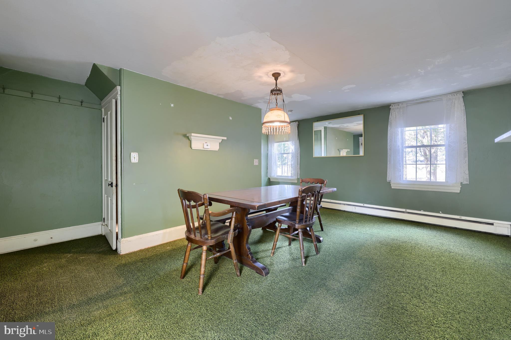 488 Fell Road Rising Sun, MD 21911 - Photo 62 of 90 a view of a dining room with furniture and chandelier