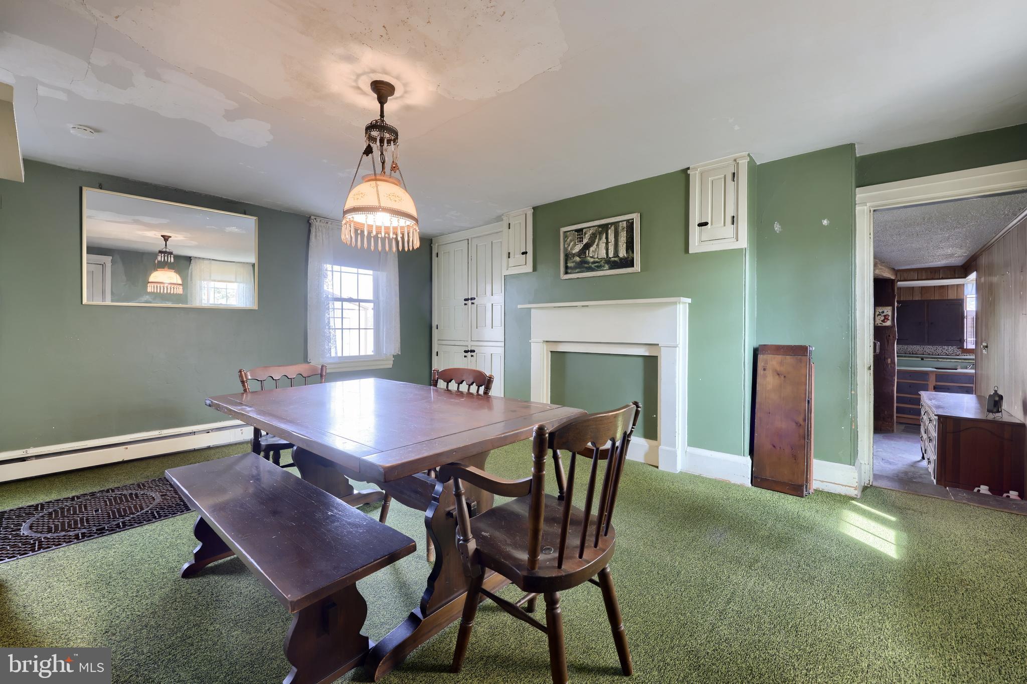 488 Fell Road Rising Sun, MD 21911 - Photo 63 of 90 a dining room with furniture a chandelier and wooden floor