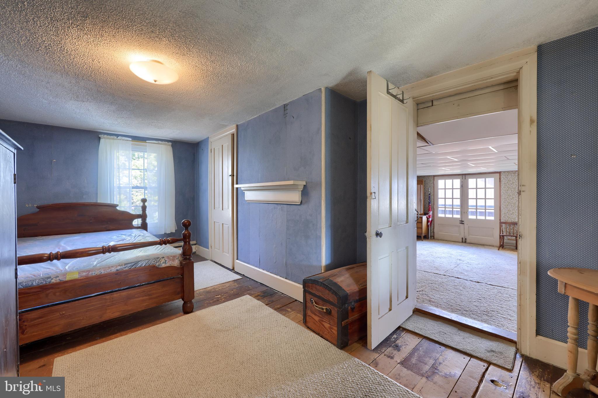 488 Fell Road Rising Sun, MD 21911 - Photo 73 of 90 a bedroom with furniture and a lamp