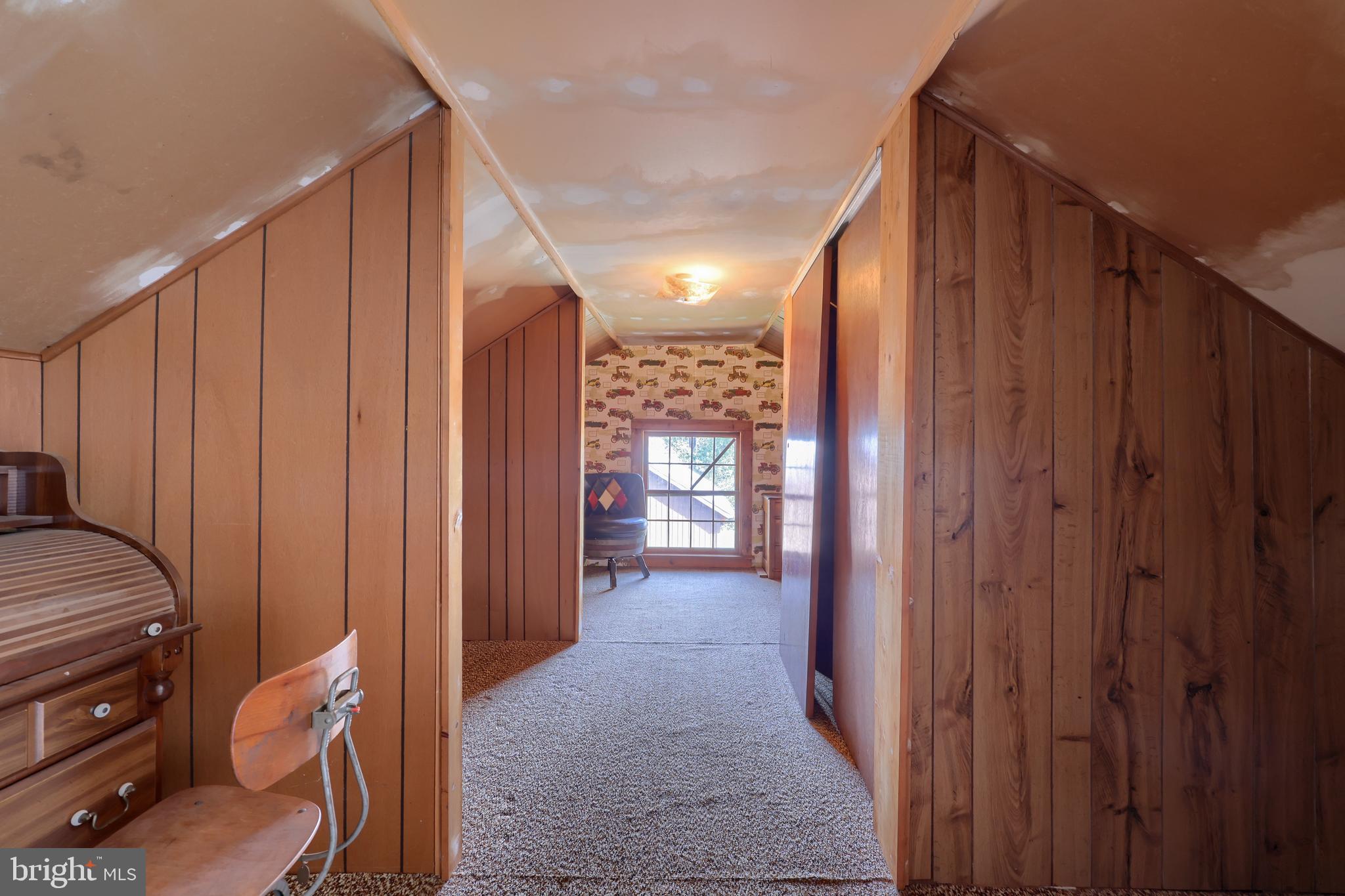 488 Fell Road Rising Sun, MD 21911 - Photo 83 of 90 a view of a hallway with wooden walls and stairs