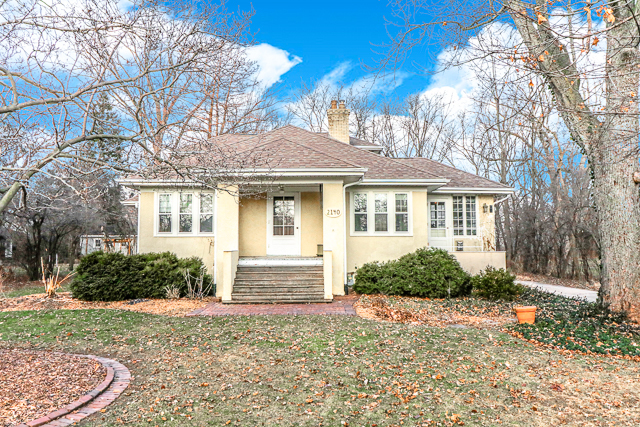 2140 Cedar Road Homewood, IL 60430 - Photo 1 of 25 a front view of a house with garden