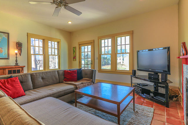 2140 Cedar Road Homewood, IL 60430 - Photo 11 of 25 a living room with furniture a flat screen tv and a large window
