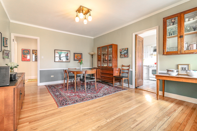 2140 Cedar Road Homewood, IL 60430 - Photo 6 of 25 a living room with furniture a wooden floor and next to a window