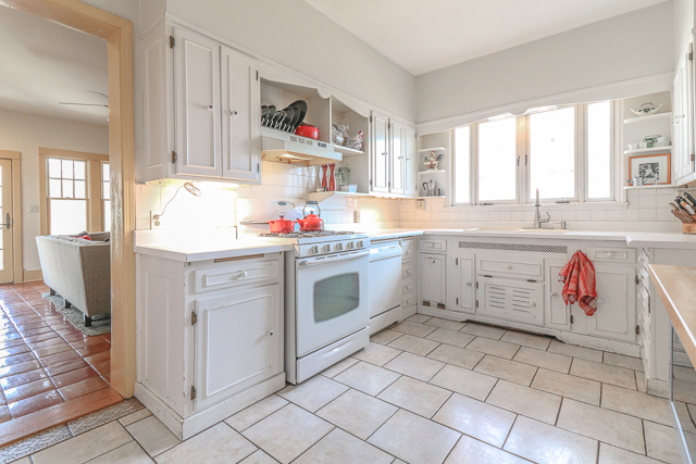 2140 Cedar Road Homewood, IL 60430 - Photo 8 of 25 a kitchen with a sink cabinets and window