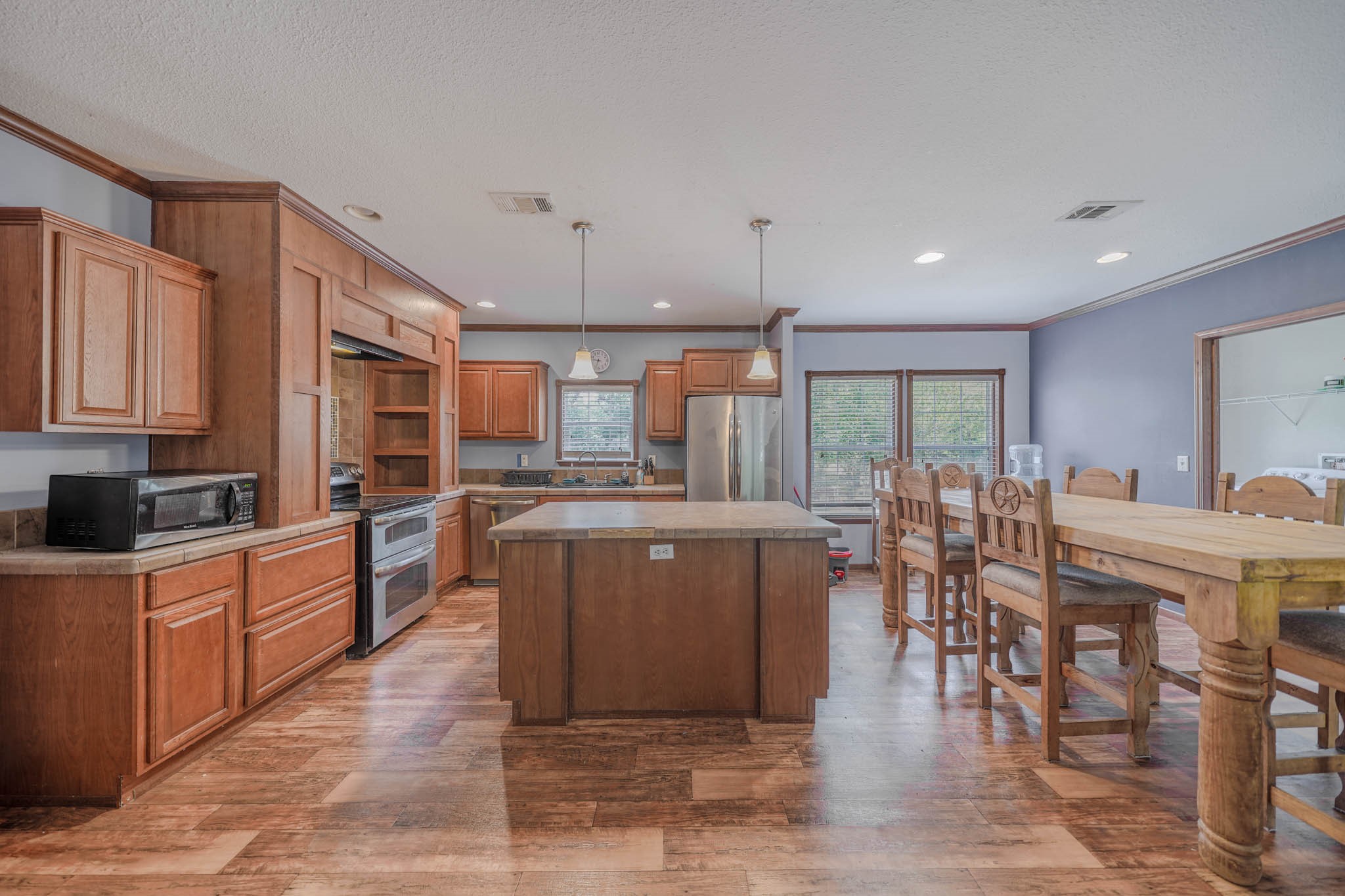 18227 Pin Oak Street Rosharon, TX 77583 - Photo 6 of 19 Great kitchen offers center island work space with built-in storage