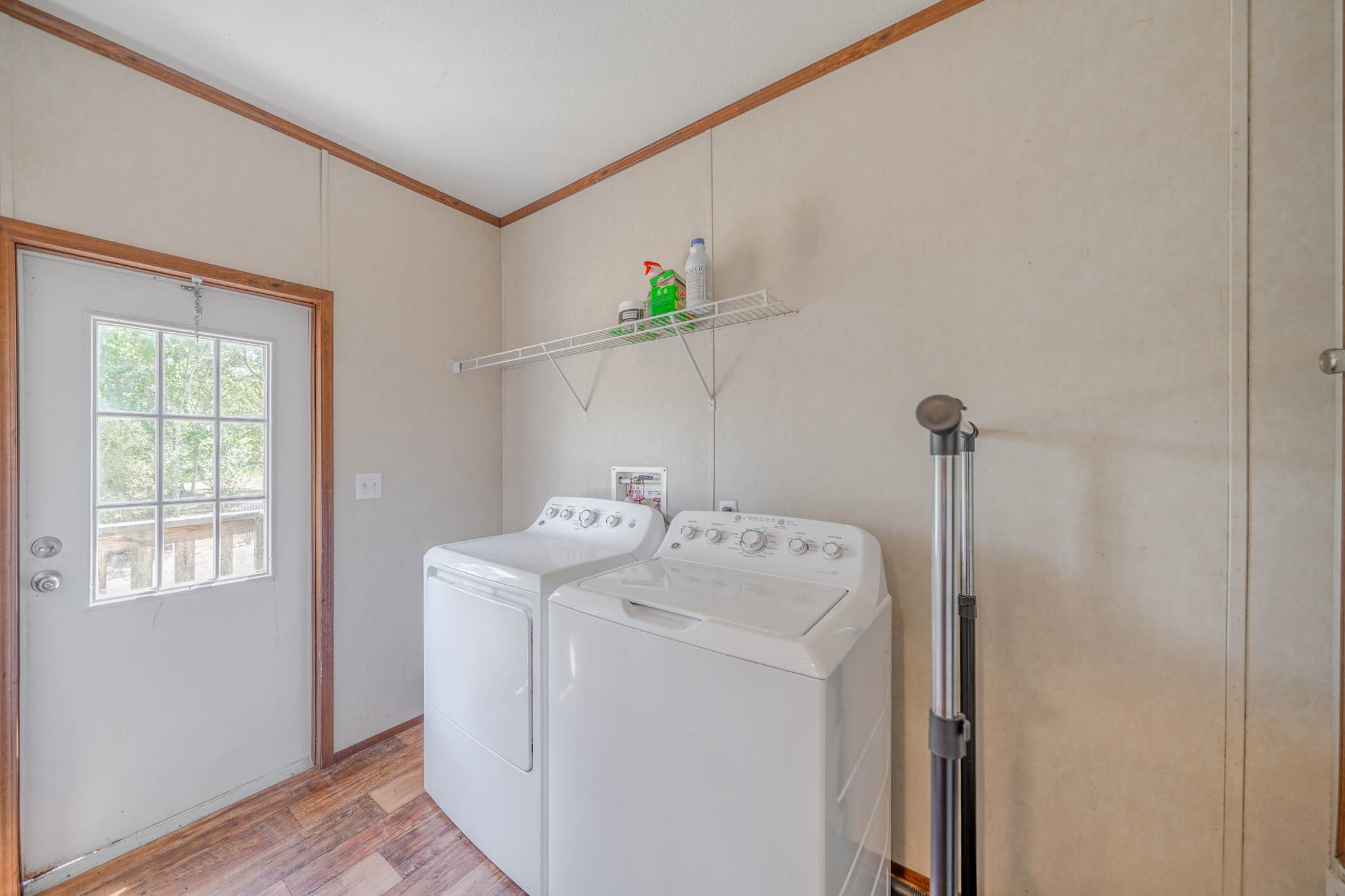 18227 Pin Oak Street Rosharon, TX 77583 - Photo 9 of 19 Inside laundry room with walk in pantry