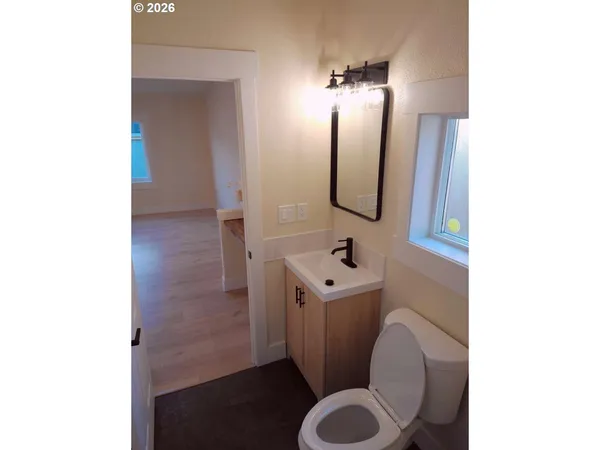 a view of a backyard of the house