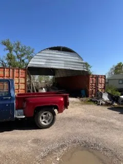 a view of house with outdoor space and parking
