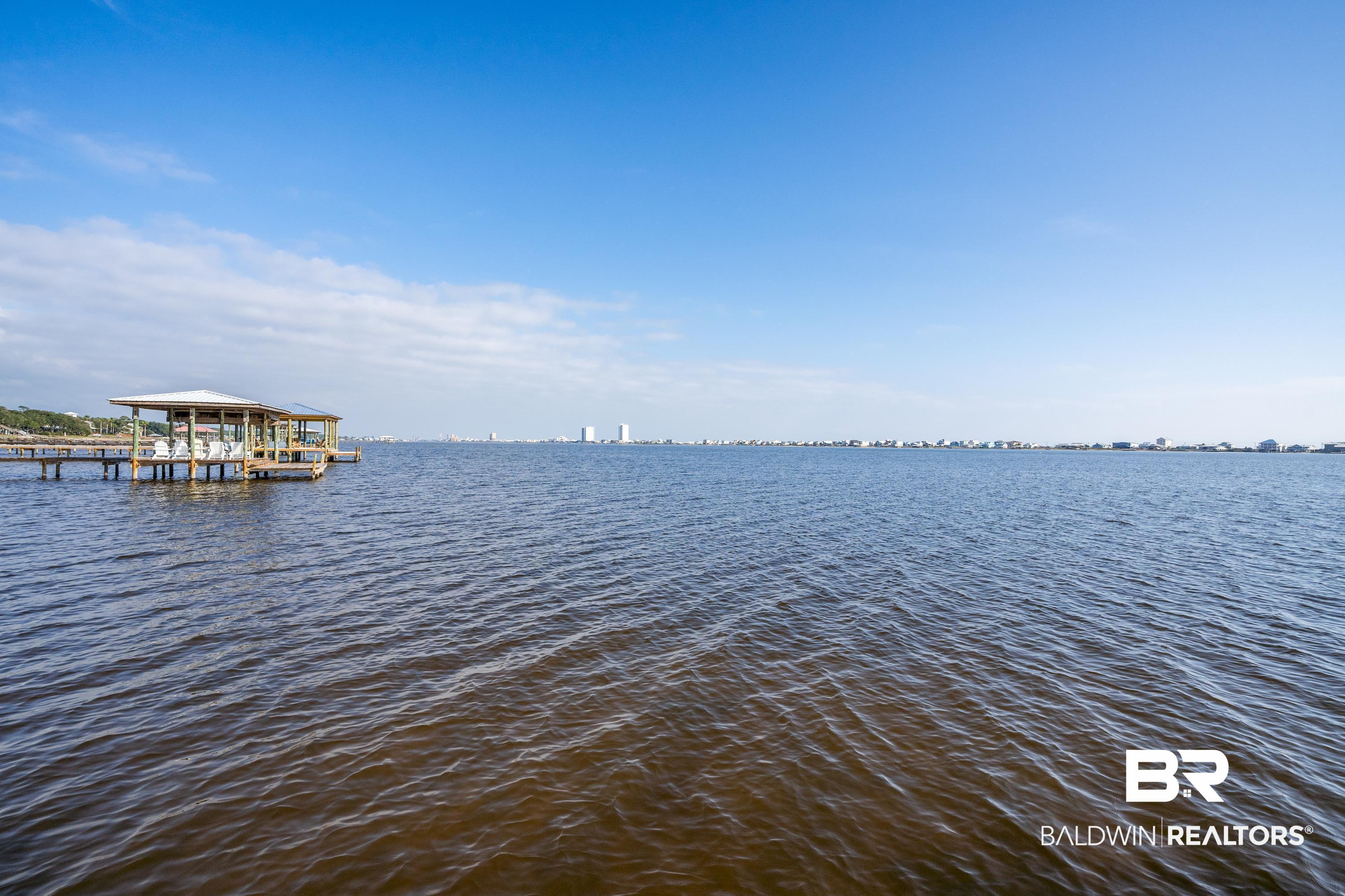 14686 State Highway Gulf Shores, AL 36542 - Photo 36 of 44 Water view featuring a dock