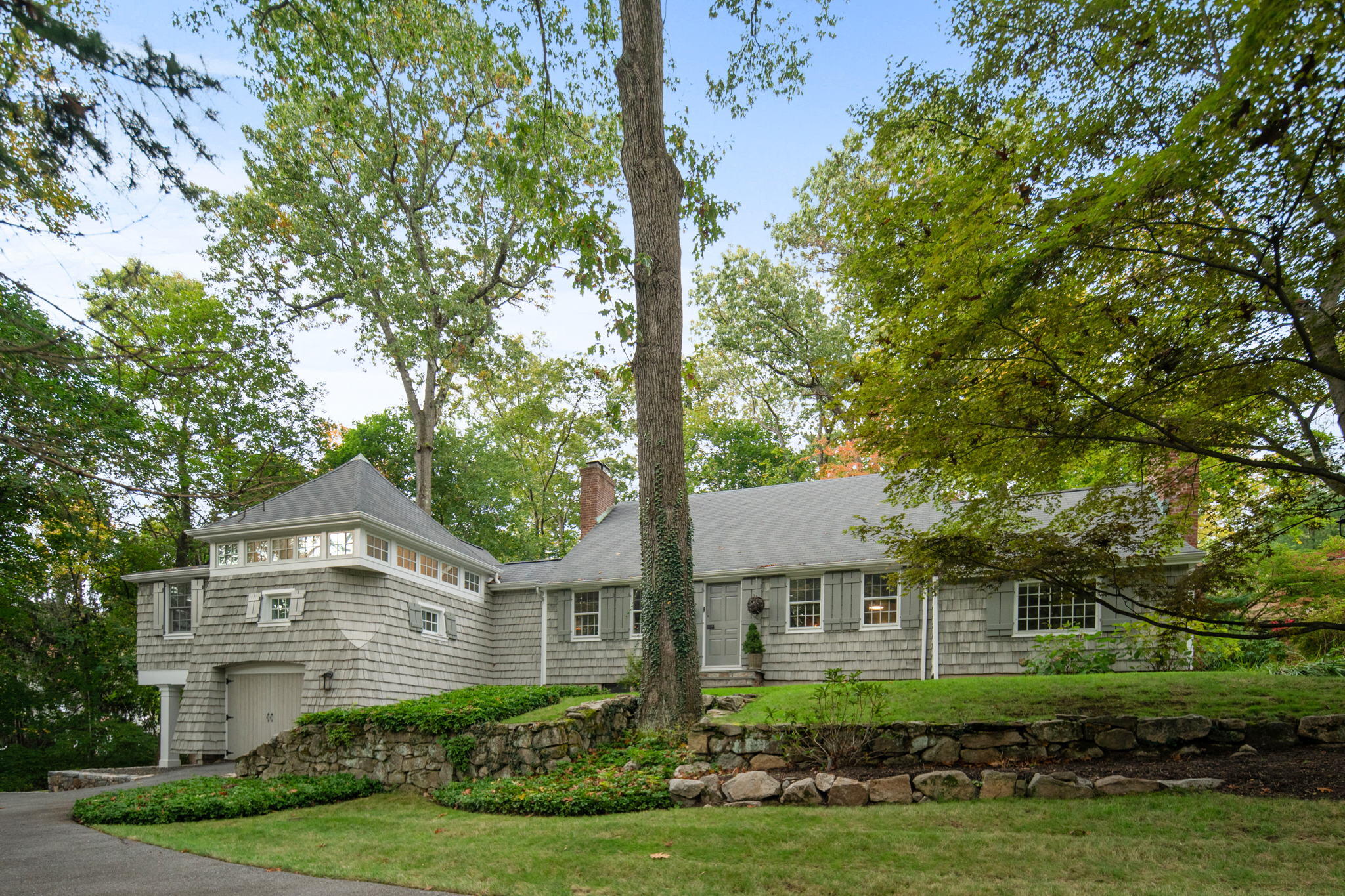front view of a house with a yard
