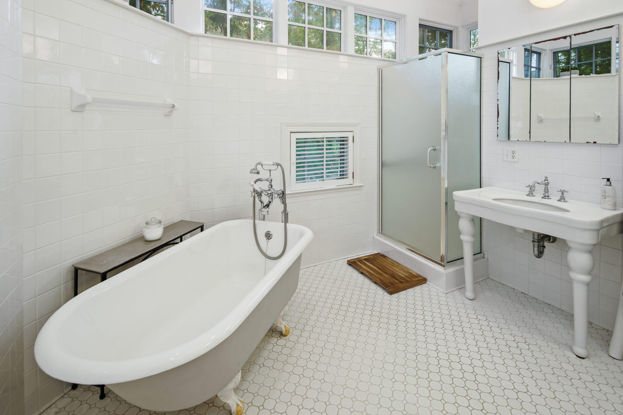 7 Little Brook Road Rowayton, CT 06853 - Photo 18 of 36 a bathroom with a sink toilet and mirror