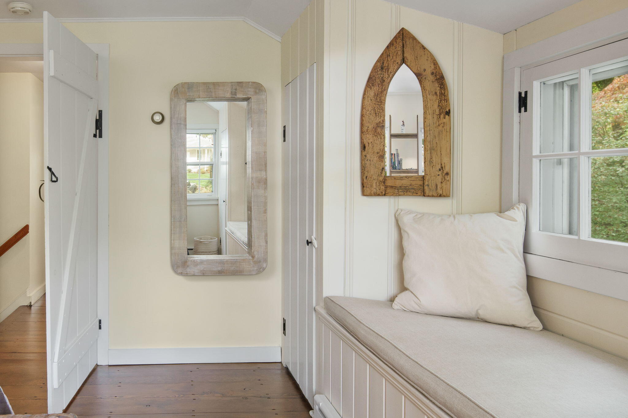 7 Little Brook Road Rowayton, CT 06853 - Photo 21 of 36 a bedroom with a bed and a painting on the wall