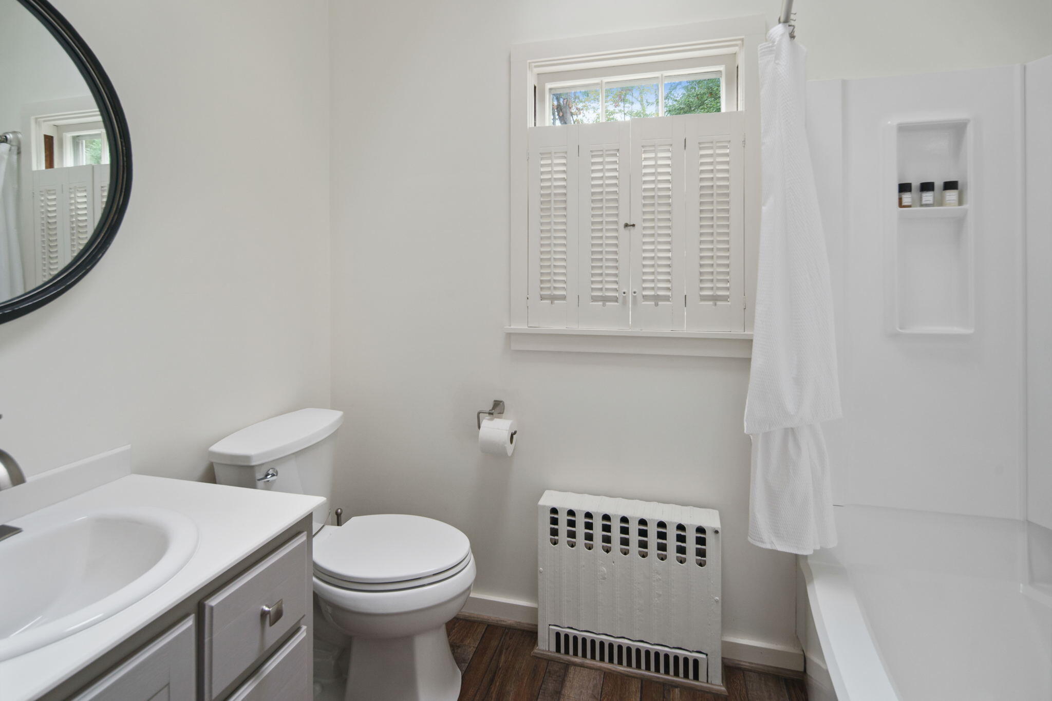 7 Little Brook Road Rowayton, CT 06853 - Photo 25 of 36 a bathroom with a toilet a sink and a mirror