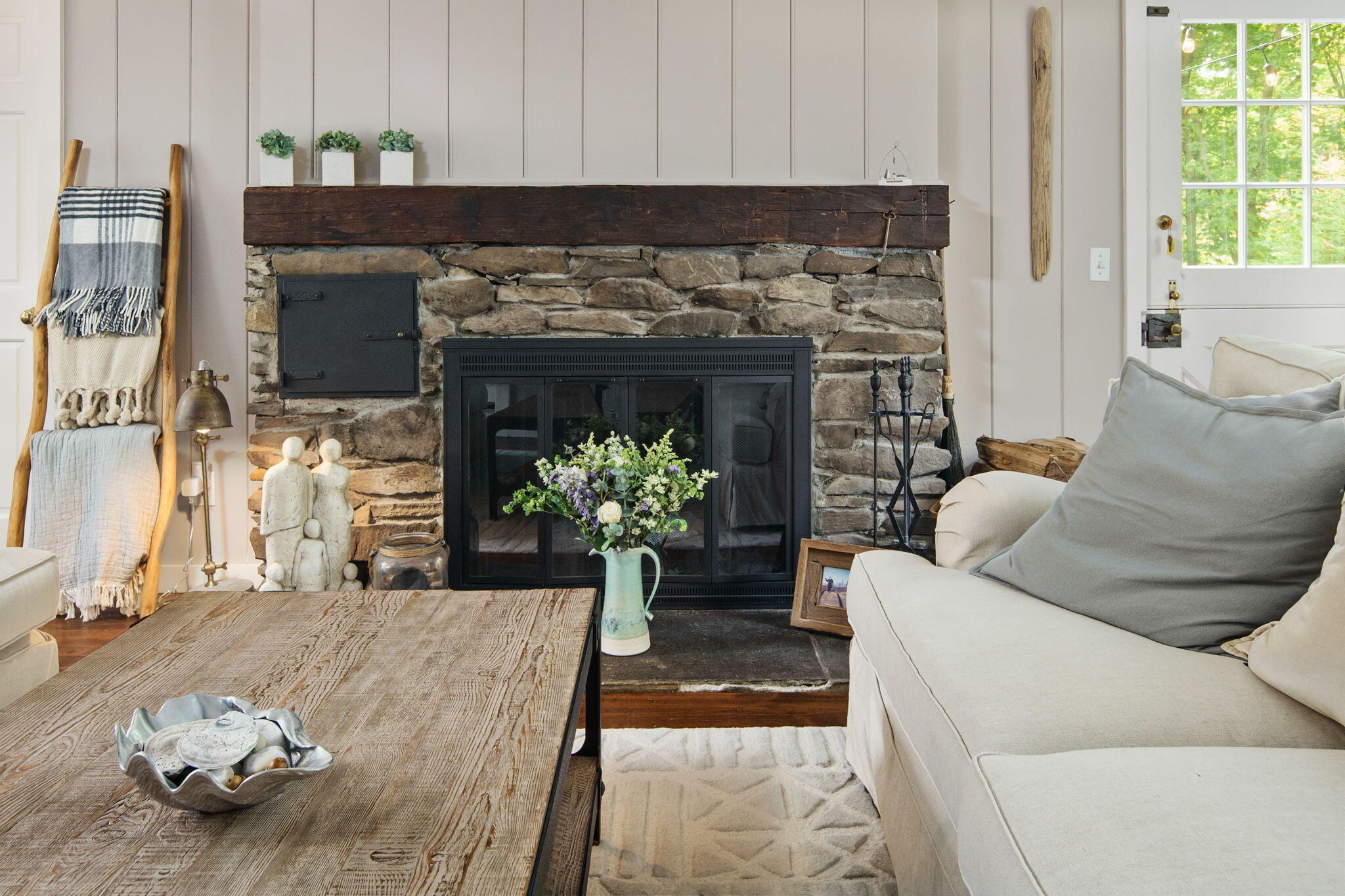 7 Little Brook Road Rowayton, CT 06853 - Photo 7 of 36 a living room with furniture and a fireplace