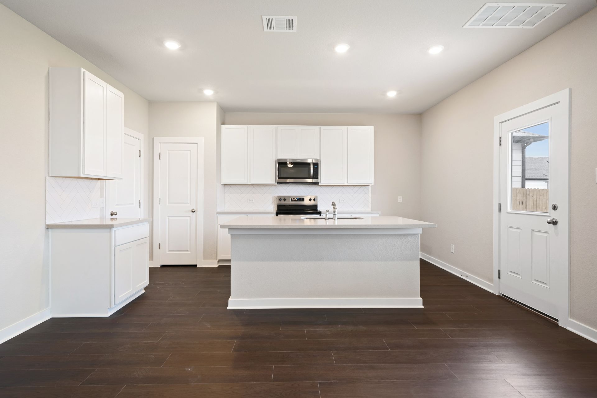 13801 Ryan Range Lane Elgin, TX 78621 - Photo 5 of 28 Open Concept Kitchen - Representative Photo