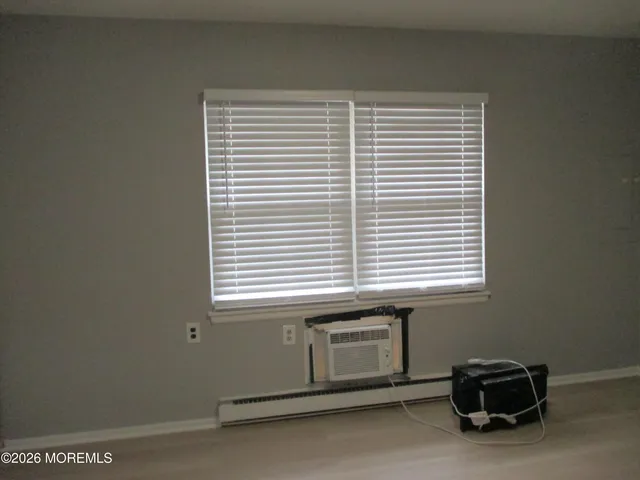 a view of a room with a window