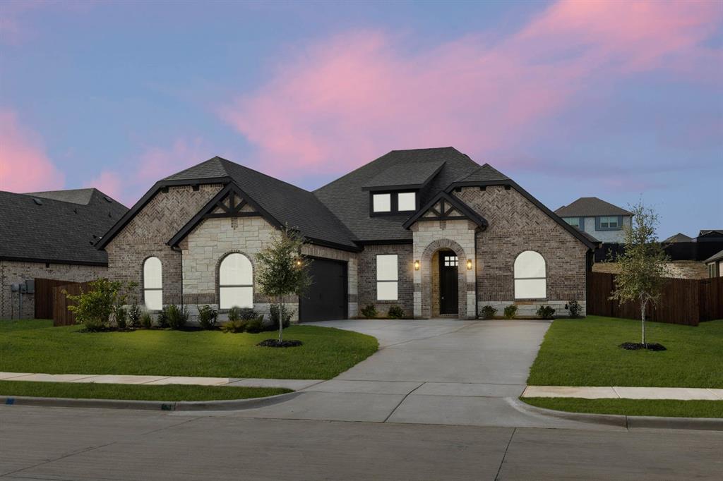 733 Wine Cup Way Midlothian, TX 76065 - Photo 1 of 30 a front view of a house with a yard