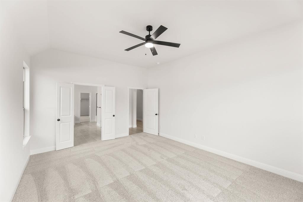 733 Wine Cup Way Midlothian, TX 76065 - Photo 13 of 30 a view of a livingroom with a ceiling fan and window