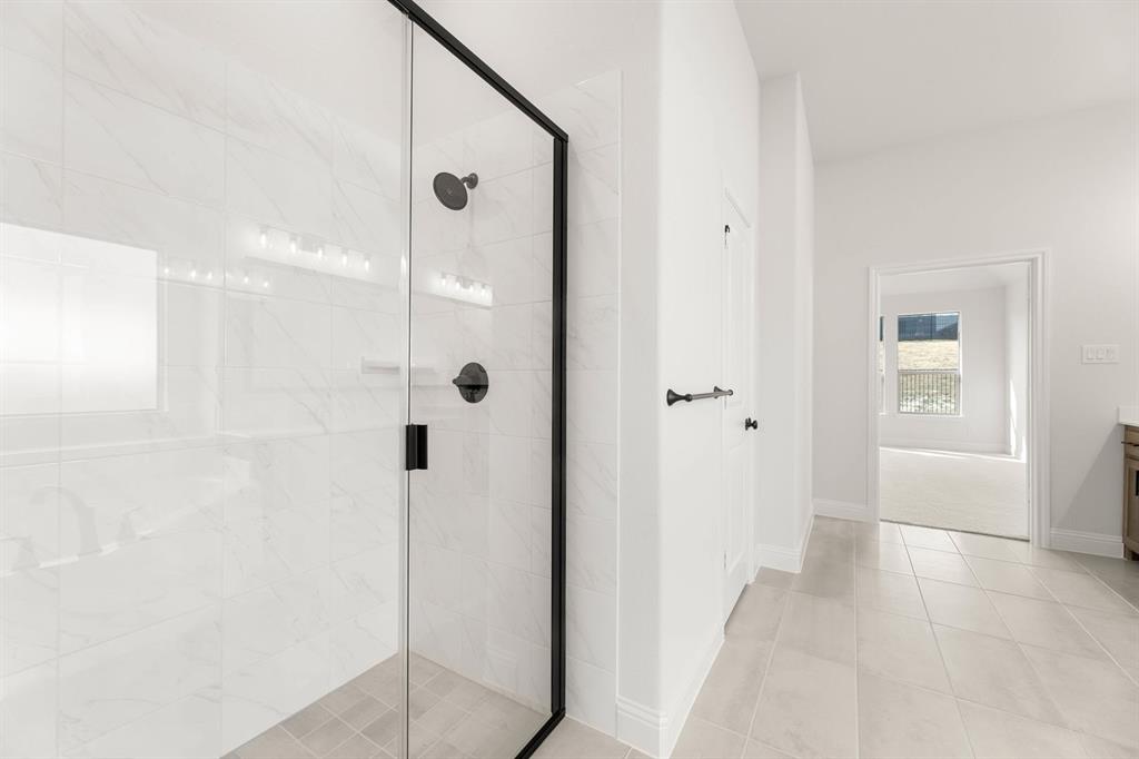 733 Wine Cup Way Midlothian, TX 76065 - Photo 16 of 30 a bathroom with a shower