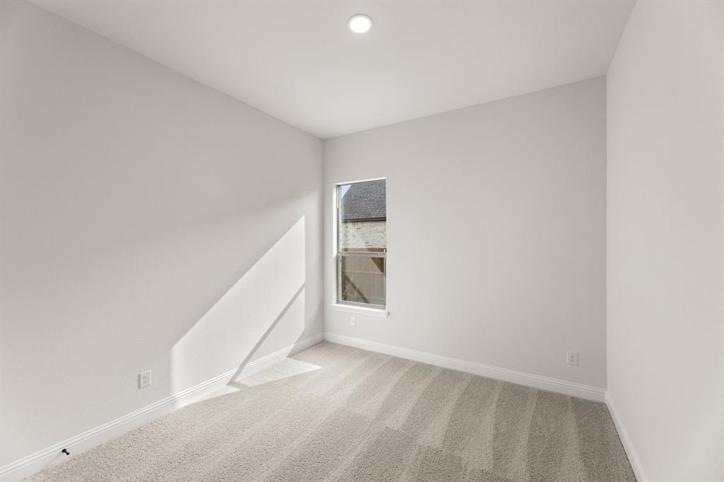 733 Wine Cup Way Midlothian, TX 76065 - Photo 18 of 30 a view of a big room with closet and windows