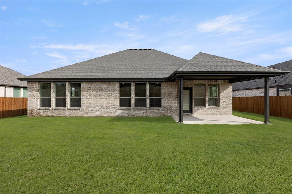 733 Wine Cup Way Midlothian, TX 76065 - Photo 25 of 30 a front view of a house with a garden
