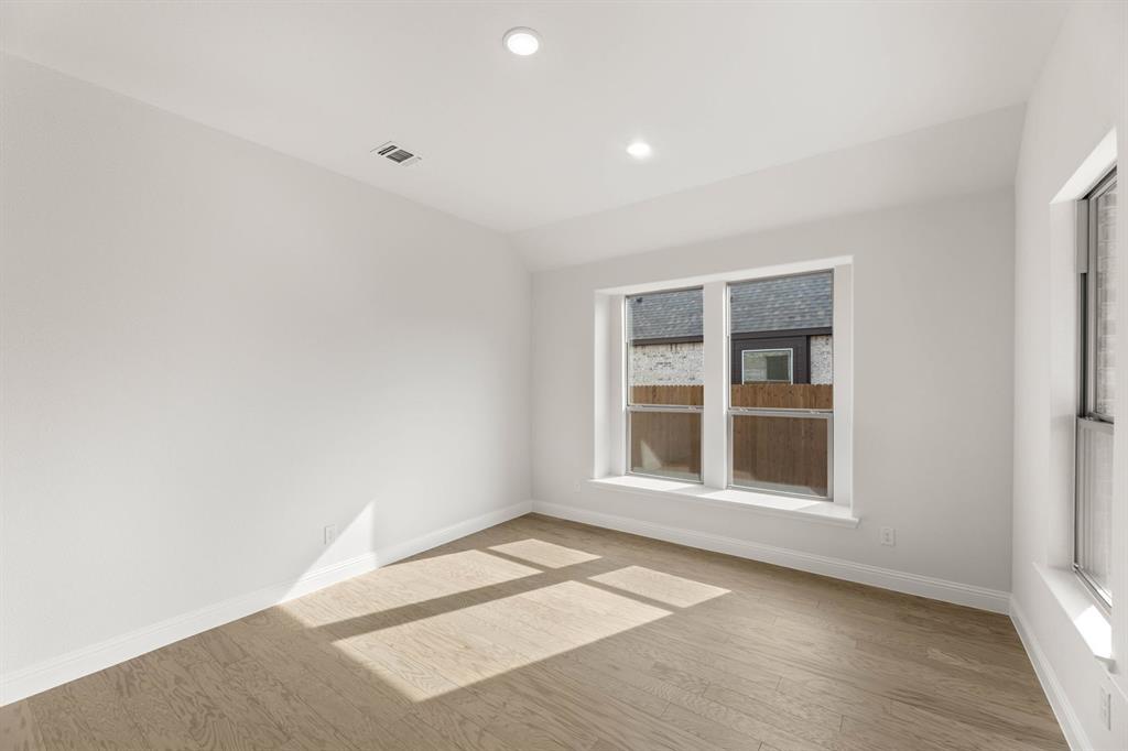 733 Wine Cup Way Midlothian, TX 76065 - Photo 8 of 30 an empty room with a window