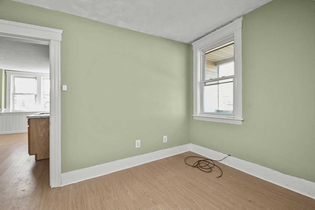 23 Ashton Street Worcester, MA 01605 - Photo 35 of 41 an empty room with windows