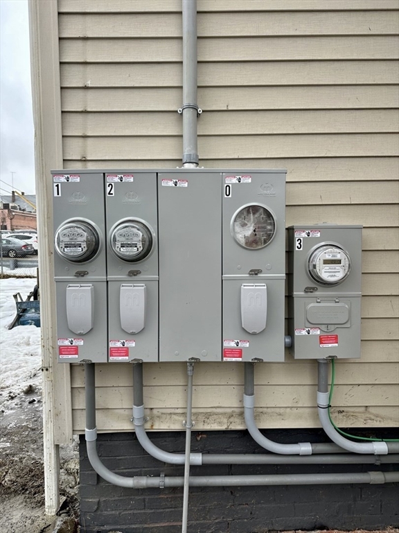 23 Ashton Street Worcester, MA 01605 - Photo 37 of 41 a room with lots of white appliances and cabinets