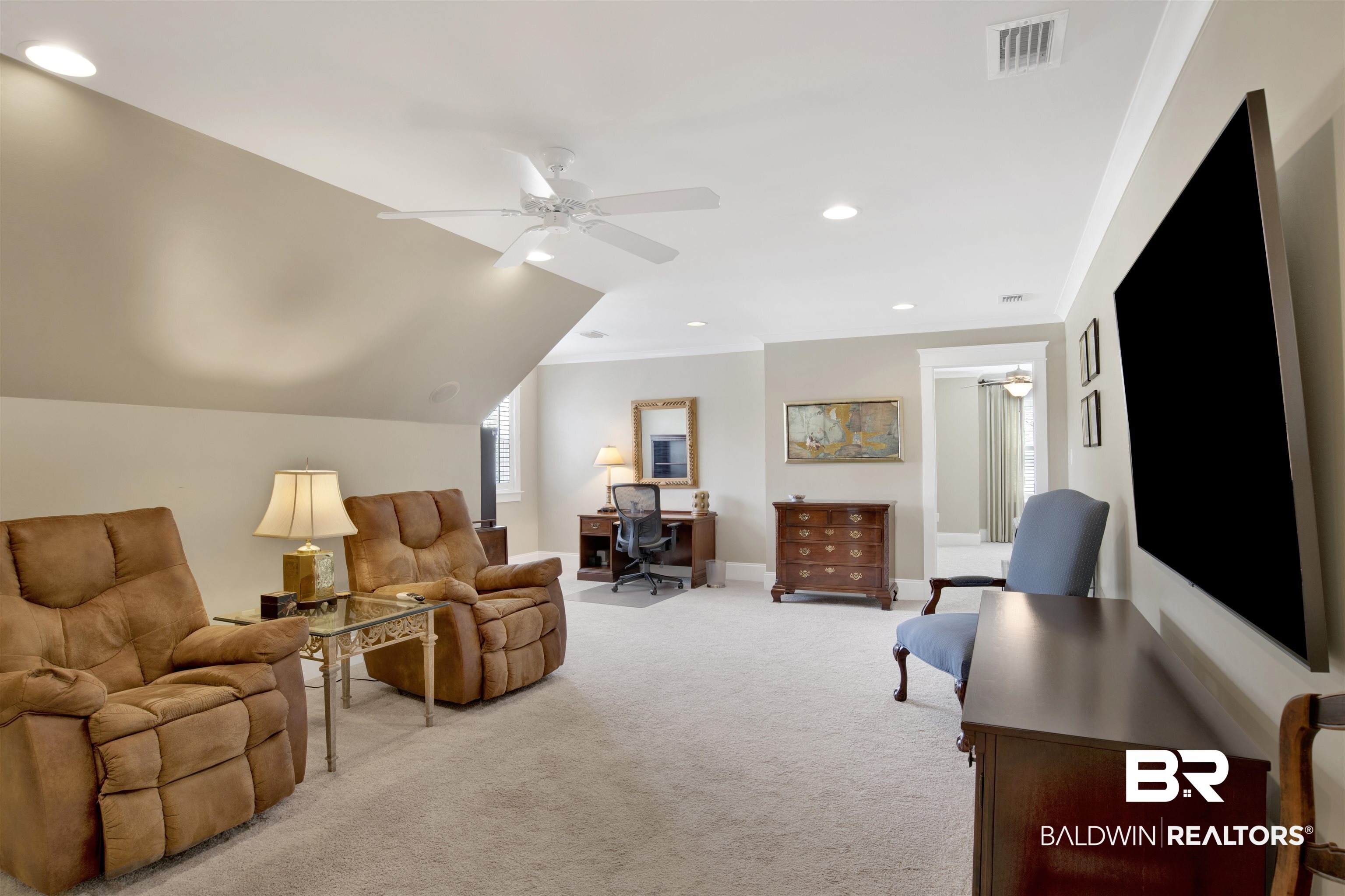 131 Sedgefield Avenue Fairhope, AL 36532 - Photo 37 of 50 Carpeted bonus room with vaulted ceiling and ceiling fan