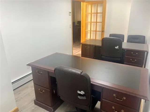 a living room with furniture and window