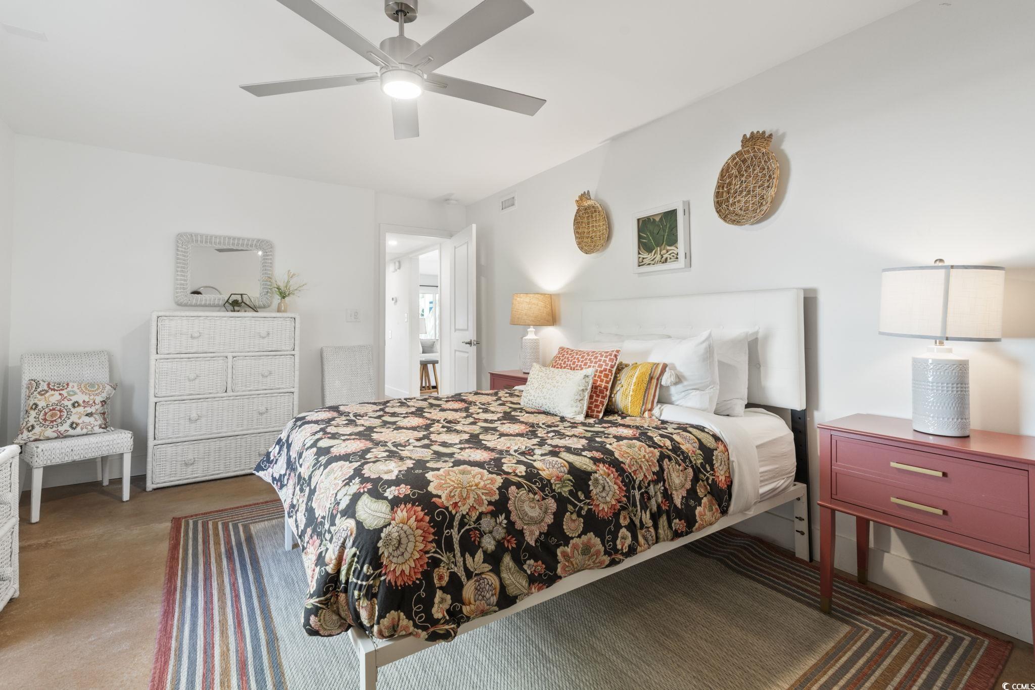 3182 State Rd S-26-816 Murrells Inlet, SC 29576 - Photo 15 of 40 Carpeted bedroom with ceiling fan