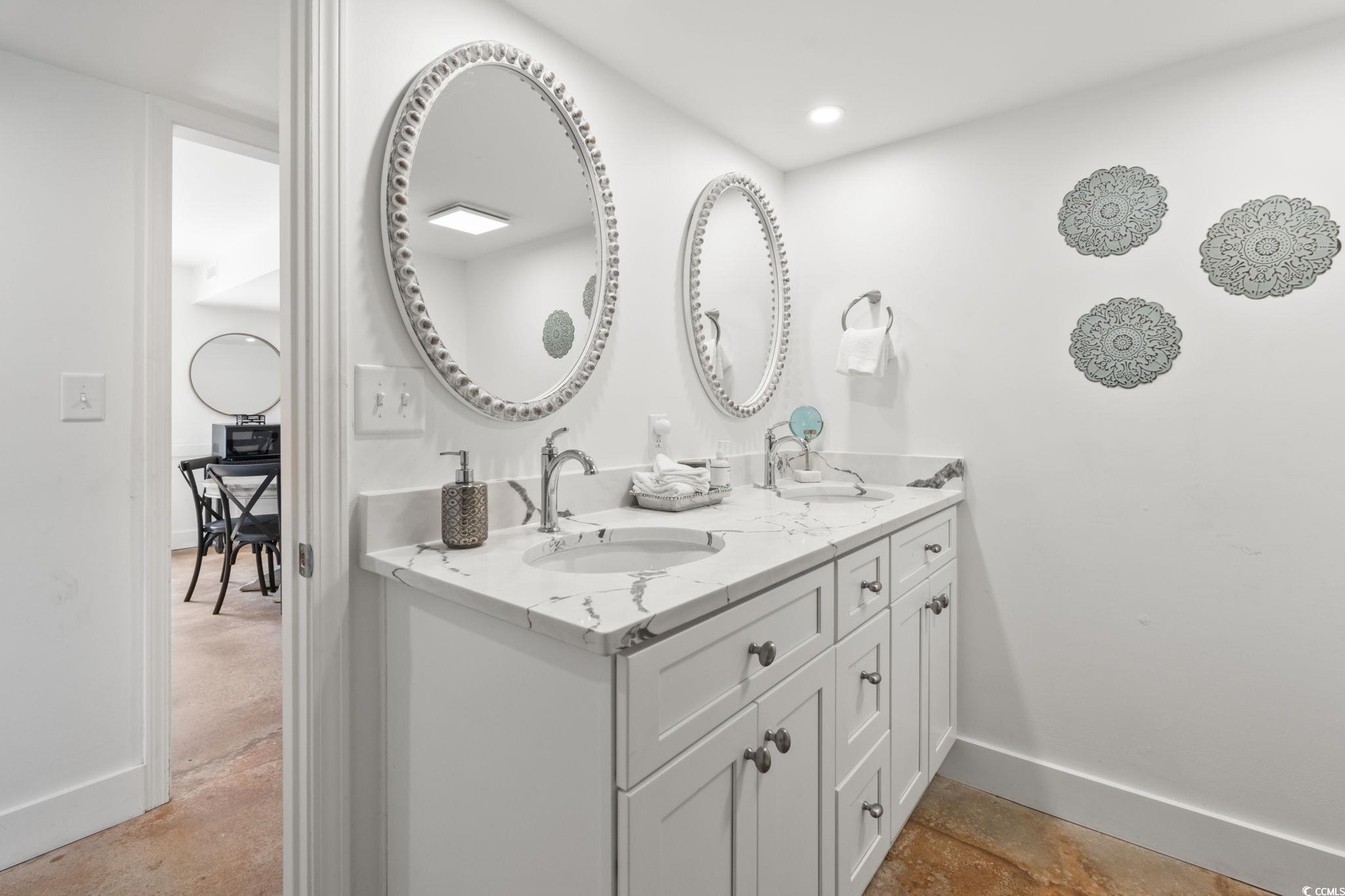 3182 State Rd S-26-816 Murrells Inlet, SC 29576 - Photo 17 of 40 Full bath with baseboards and double vanity