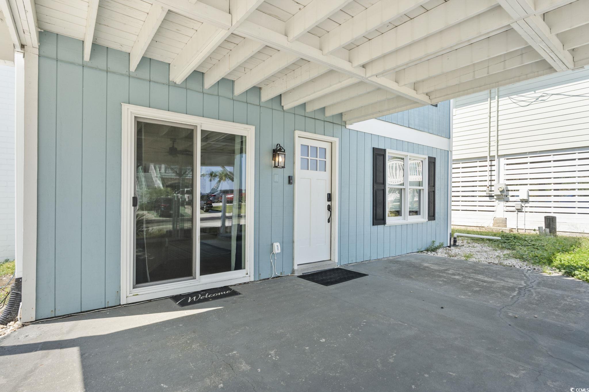 3182 State Rd S-26-816 Murrells Inlet, SC 29576 - Photo 18 of 40 Doorway to property featuring a patio area