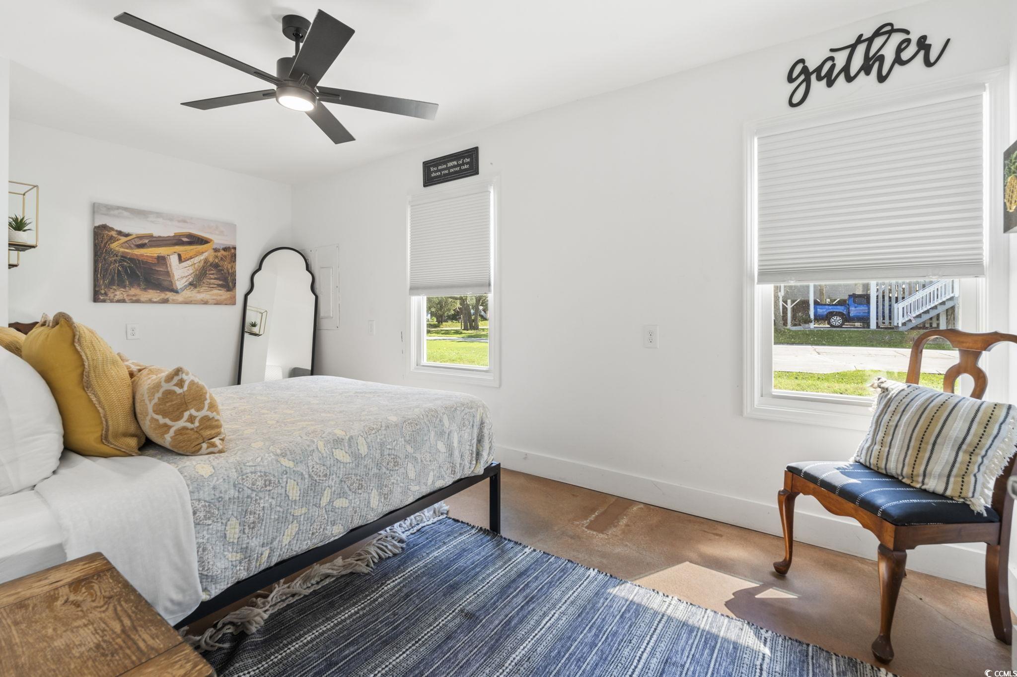 3182 State Rd S-26-816 Murrells Inlet, SC 29576 - Photo 26 of 40 Bedroom with baseboards and a ceiling fan