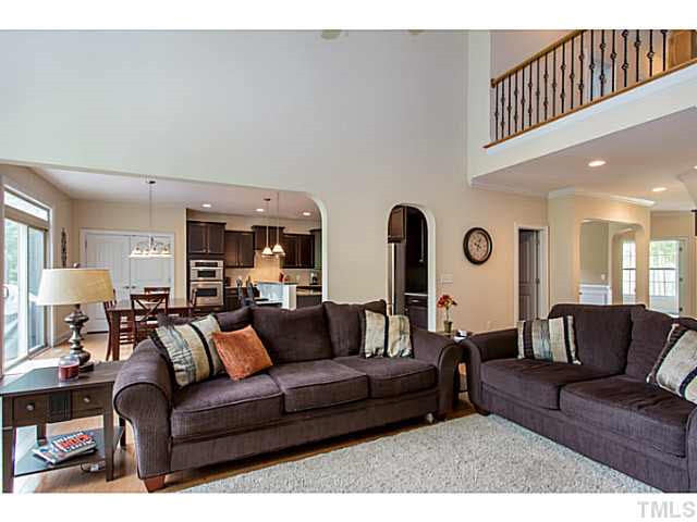 13028 Saxon Way Raleigh, NC 27613 - Photo 20 of 21 The family room is right next to the kitchen providing the perfect flow for ENTERTAINING in this OPEN FLOORPLAN. Den/Family/Great Room