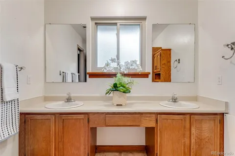 a bathroom with a shower a toilet and sink