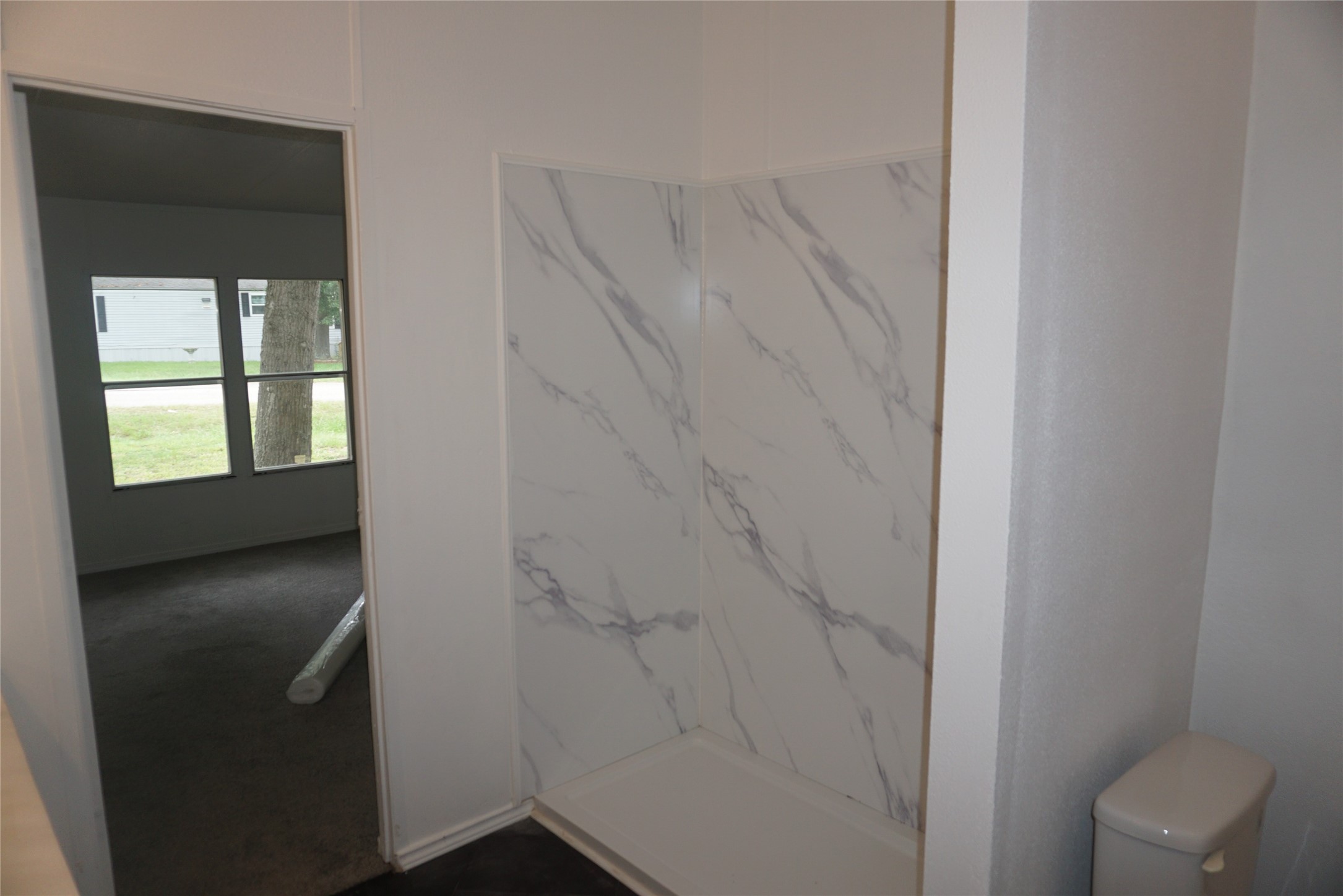 9603 Cedar Ridge Court Willis, TX 77318 - Photo 13 of 25 a bathroom with a toilet