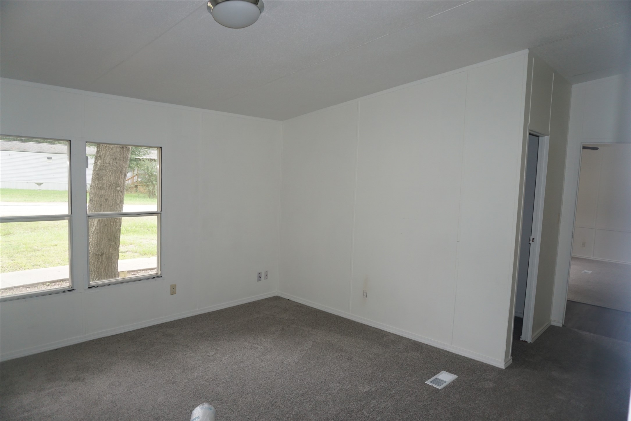 9603 Cedar Ridge Court Willis, TX 77318 - Photo 14 of 25 an empty room with windows